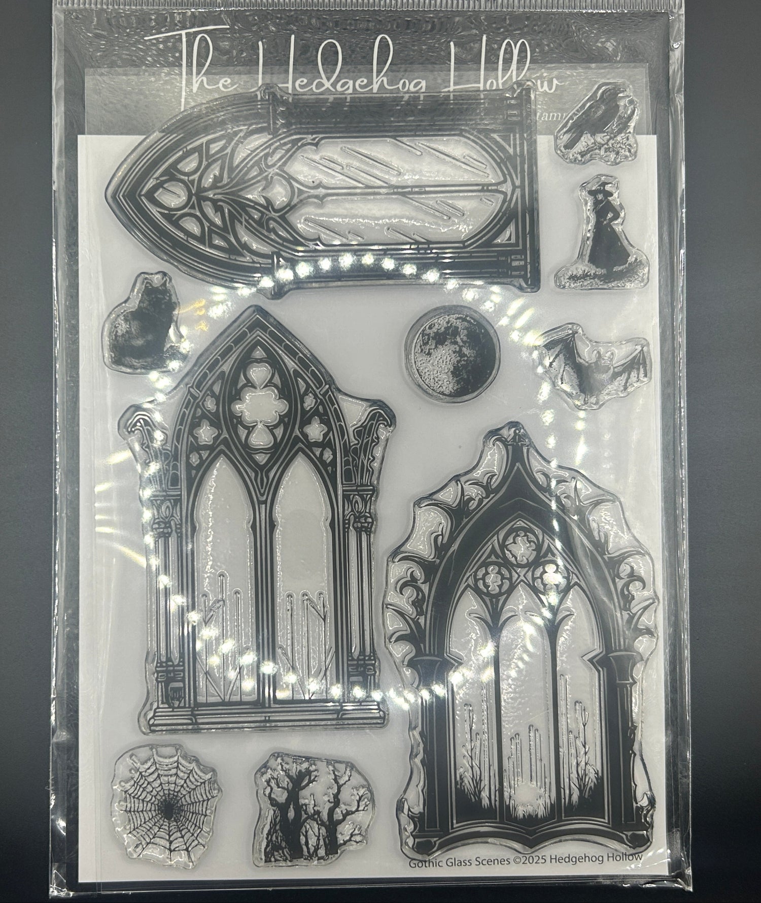 Clear stamp set with gothic architecture designs on a gray background
