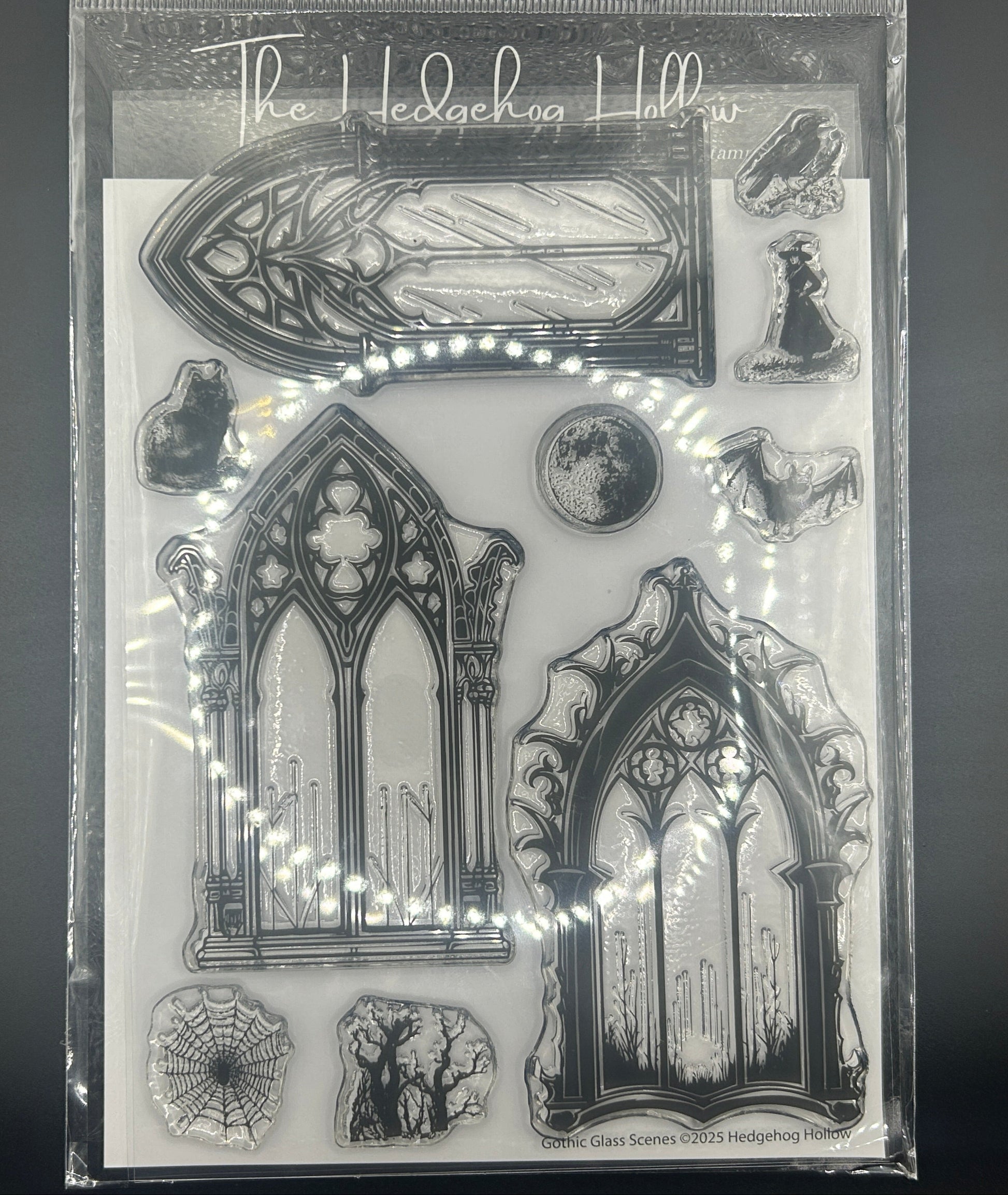 Clear stamp set with gothic architecture designs on a gray background
